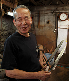 西村　功勝